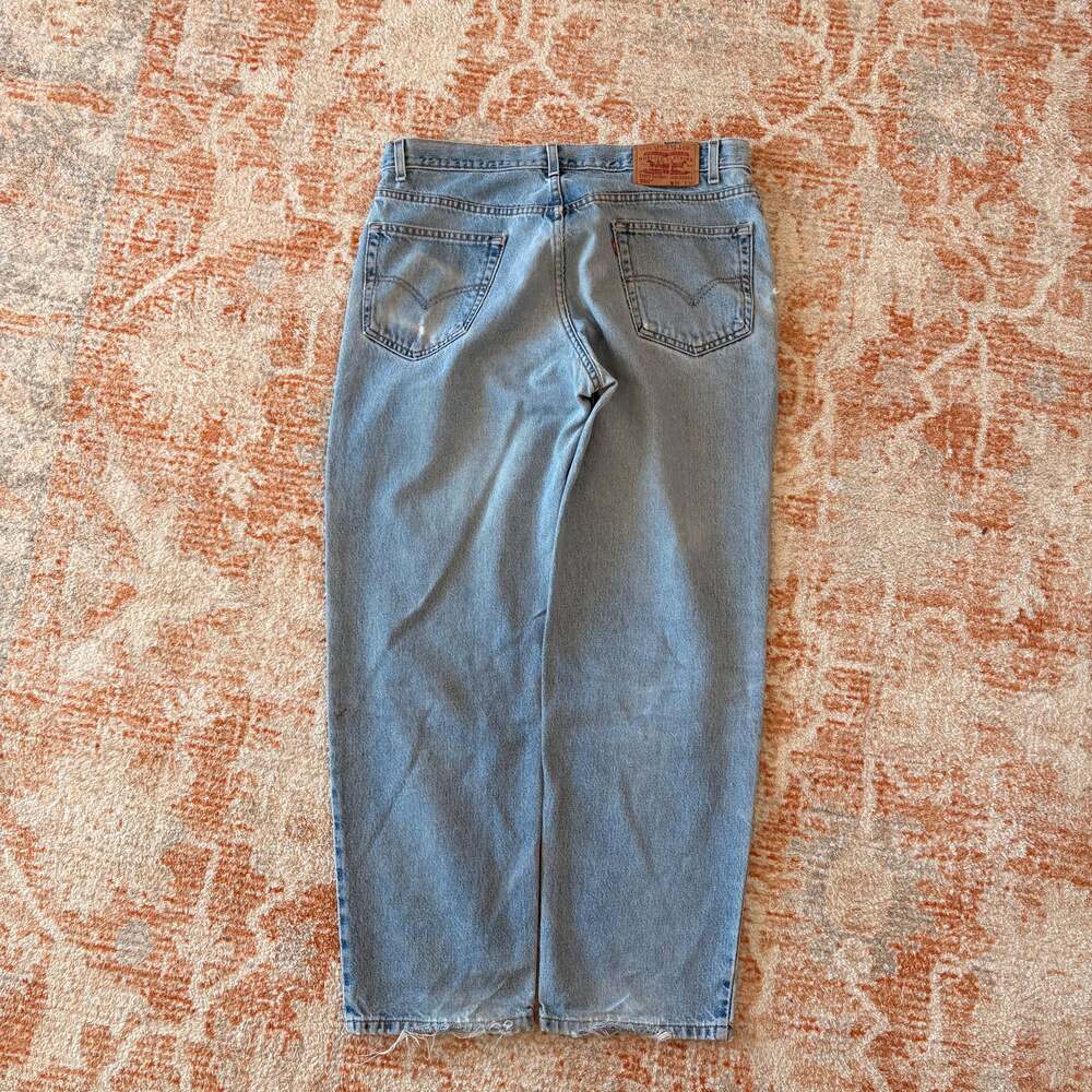 Vintage 90s Levi's 560 Comfort Fit Loose Tapered Jeans 36x30 Light Wash